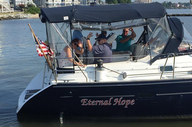 Sailboat Cruise on Chesapeake Bay - Crew Energy: Friendly History Talk and Taking the Wheel